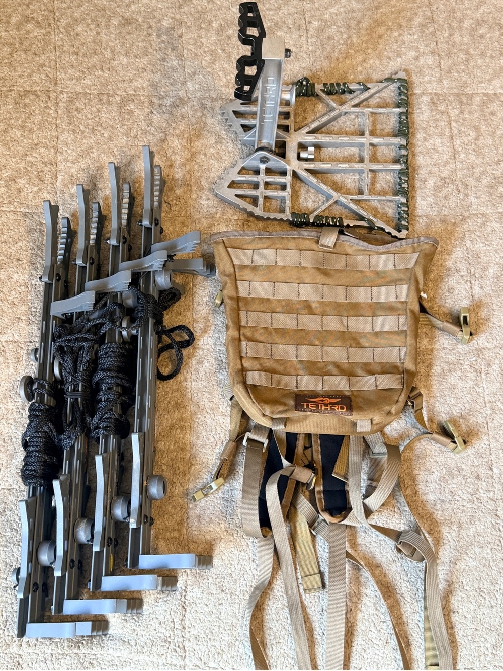 Tethrd platform hunting stand with climbing sticks